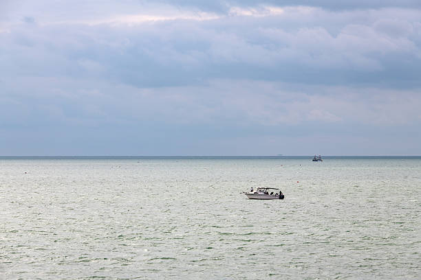 with fishing boats on the calm sea