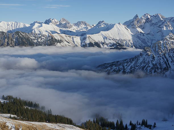 istock The sky is cloudy and the mountains are covered in snow 2239710607