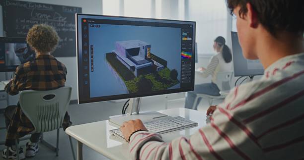 istock Student in Striped Sweatshirt Works on 3D House Project at Computer Screen 2239710829