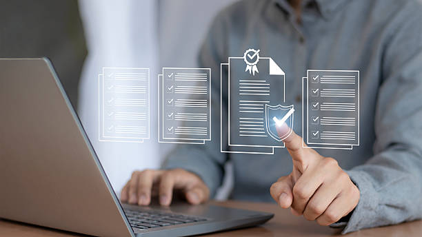 istock Digital document checklist on laptop screen. Business productivity and technology concept. Document accuracy management and clipboard. 2239713929