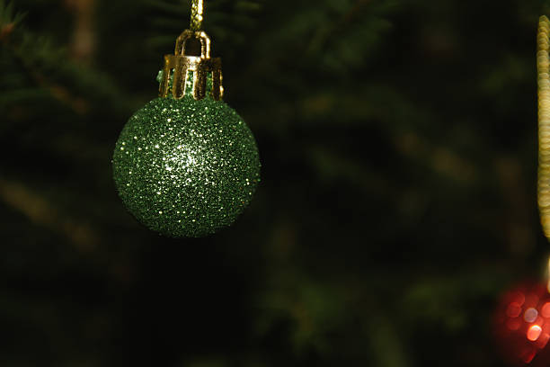 Beautiful Christmas defocused blurred background with Christmas tree lights in the evening.