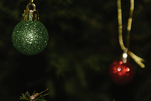 Beautiful Christmas defocused blurred background with Christmas tree lights in the evening.