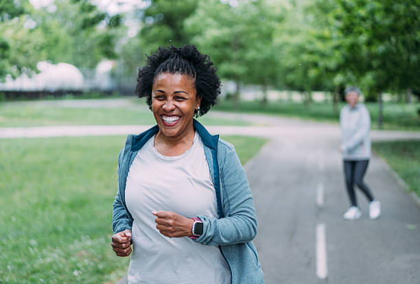 istock Friends running in the public park. 2239718858
