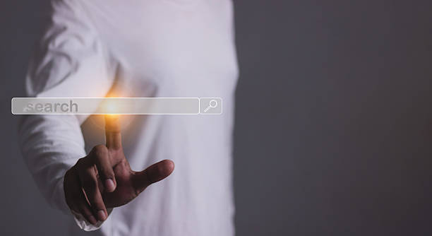istock Young man hand touching search bar, Search job 2239719779