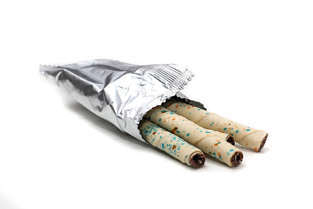 wafer stick inside foil packaging pouch isolated white background