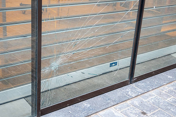 istock Building with dirty glass in broken window and door. 2239721960