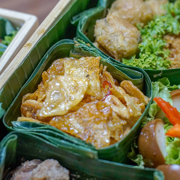 istock Authentic Indonesian fried food in banana leaf box 2239728525
