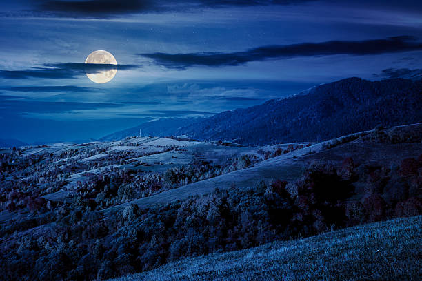 istock mountain landscape in autumn at night 2239737148