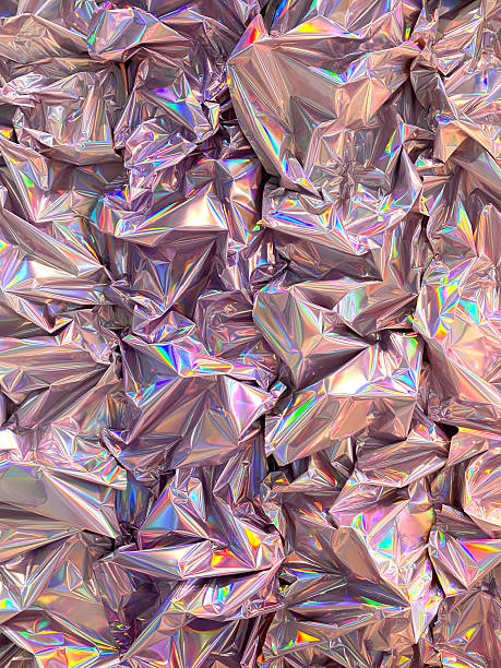 istock Holographic crumpled foil texture with iridescent reflections, suitable for abstract background 2239738017