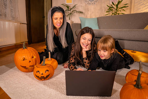 istock Family on video call for Halloween 2239739899