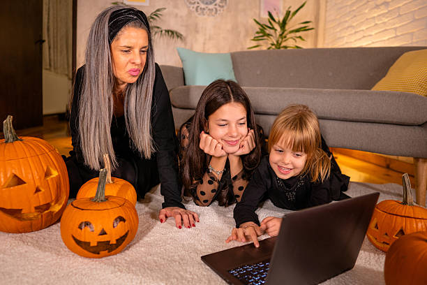 istock Family on video call for Halloween 2239739927