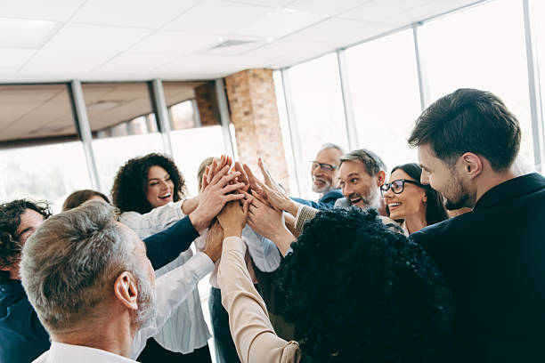 istock Diverse business team celebration with high-five connection in modern office environment emphasizing collaboration and achievement 2239748034