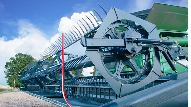 istock Soy bean Combine Head in a field-Howard County, Indiana 2239750080