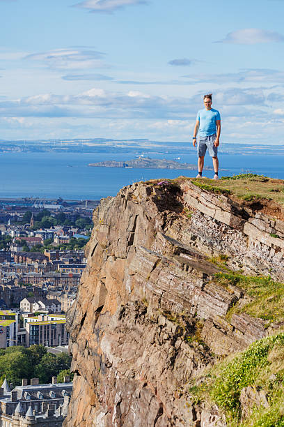 istock Confident hiker pose on Arthurs seat hill in Edinburgh, Scotland 2239751484