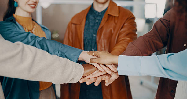 istock Hands, people and huddle in office for support, teamwork and collaboration or unity. Employees, business and solidarity for project with synergy, coworking and motivation with mission for meeting 2239752536