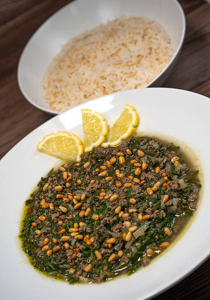 istock Spinach or Sabanekh with chicken a Mediterranean dish served with rice 2239759984