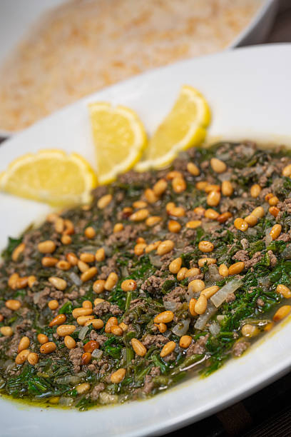 istock Spinach or Sabanekh with chicken a Mediterranean dish served with rice 2239760047