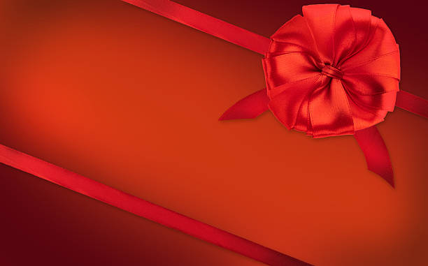 istock Red Gift Ribbon and Satin Bow on Gradient Background 2239760493