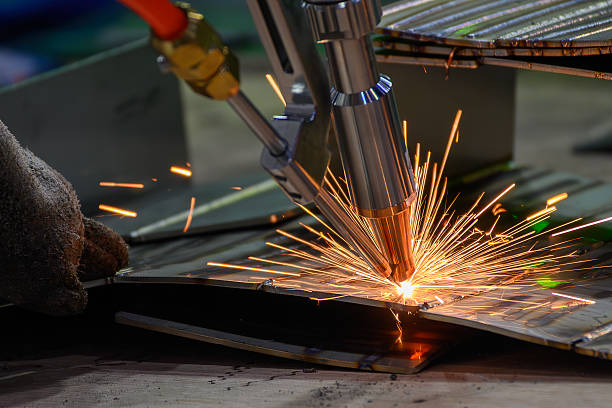 istock Close up scene the laser welding process by hand held laser welding machine 2239760601