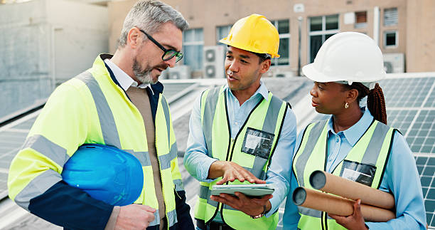 istock Engineering, people and tablet with plan for solar panel inspection, maintenance and clean energy chat outdoor. Renewable, team and employees with digital checklist for installation assessment 2239763926