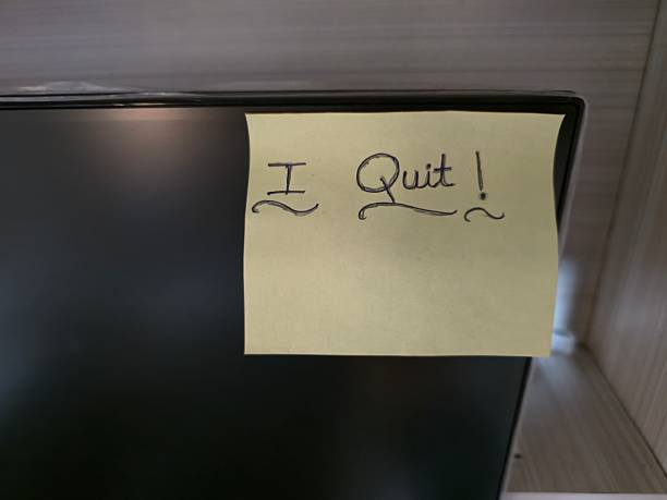 istock A green sticky note of resignation on computer monitor 2239764366
