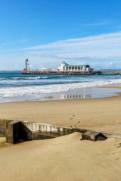 istock Bournemouth Pier with waves on the beach 2239767625