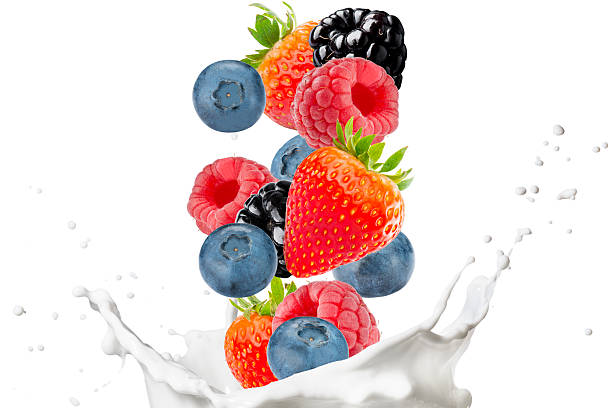 istock Fresh Berrys and Milk Splash On White Background 2239770431