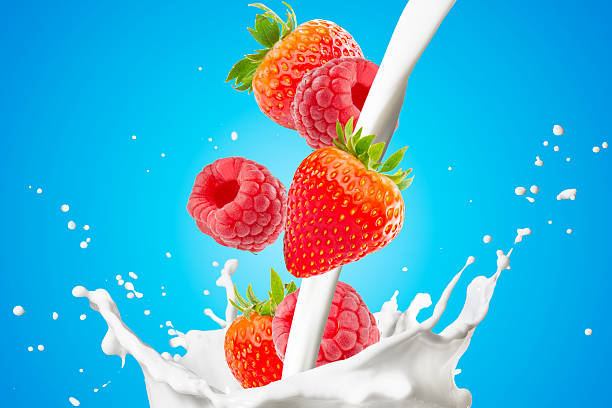 istock Fresh Berrys and Milk Splash On White Background 2239770562