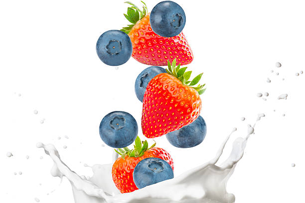istock Fresh Berrys and Milk Splash On White Background 2239770618