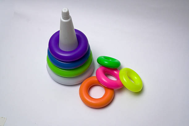 istock Colorful stacking rings toy partially assembled for kids learning 2239770805