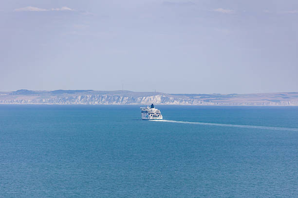 Ferry crossing the English Channel from Dover with the coast of France in the distance.