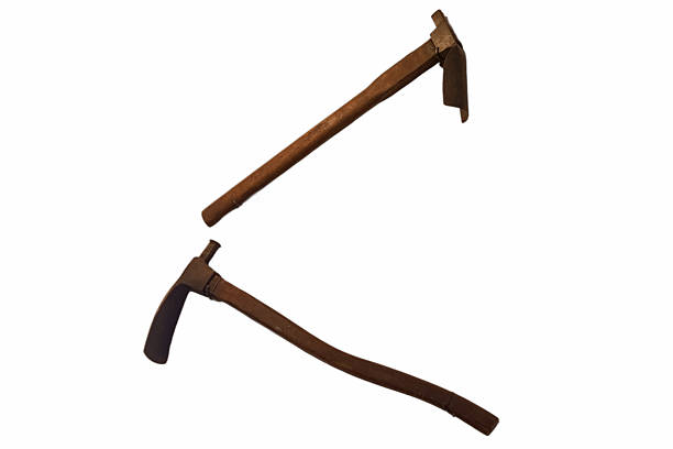 Rusty old hoe isolated on white background. Vintage agricultural tool.