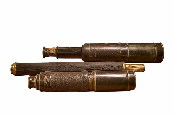 istock Historical telescopes displayed on a white background, showcasing vintage design and craftsmanship from the 19th century 2239775169