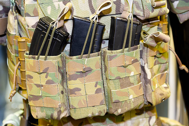 istock A person wearing a tactical vest and rifle mags 2239779630