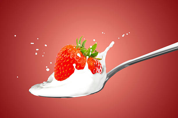 istock Milk Splash with Fresh Strawberry Fruit 2239785818