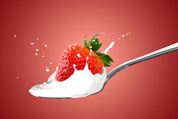 istock Milk Splash with Fresh Strawberry Fruit 2239785827