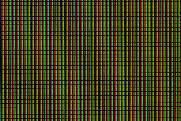 Macro close-up of illuminated LED panel with red, green, and blue light points.