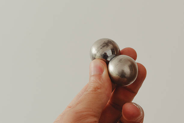 istock A man's hand with CNC spheres in daylight 2239787409