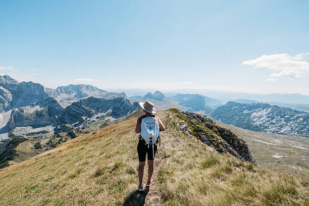 istock Woman Hiking Trail with Mountain View 2239792955