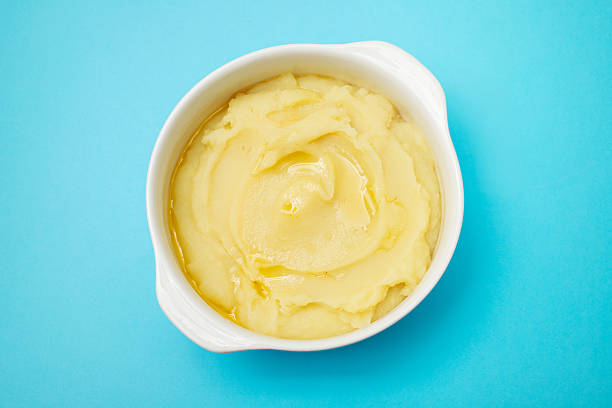 istock Mashed potato with olive oil in white bowl 2239793804