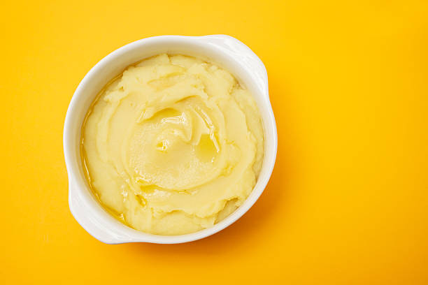istock Mashed potato with olive oil in white bowl 2239793807