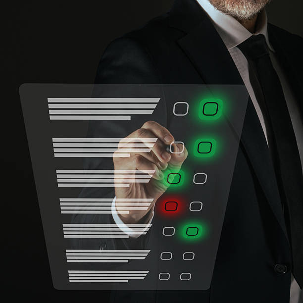 istock Man do online exam on virtual screen. Answer a survey filling out a tech form. Quiz, test concept 2239794109