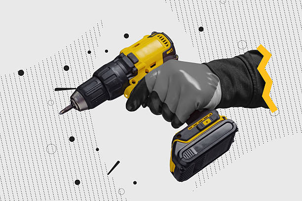 istock Pop art collage showing a worker hand in protective gloves holding a yellow cordless drill on a white abstract background. Concept of construction work, renovation, DIY and industrial tools. 2239799155