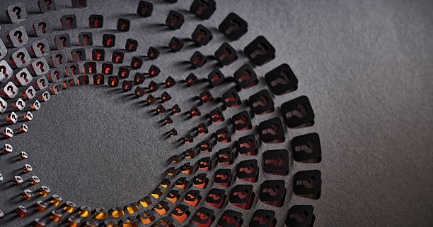 istock Spiral Arrangement of Cut Paper Question Marks in Gradient Lighting 2239800640
