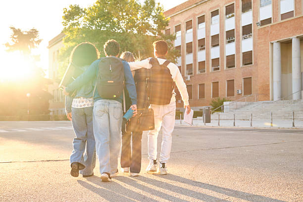 istock University students walking together on campus during sunset 2239801530