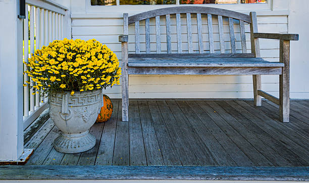istock Wooden Bench on the Porch 2239805440