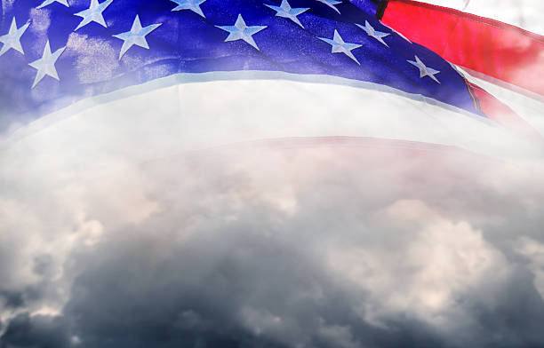 istock Close up American flag in clouds 2239810144