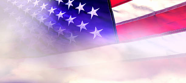 istock Close up American flag in clouds 2239810146