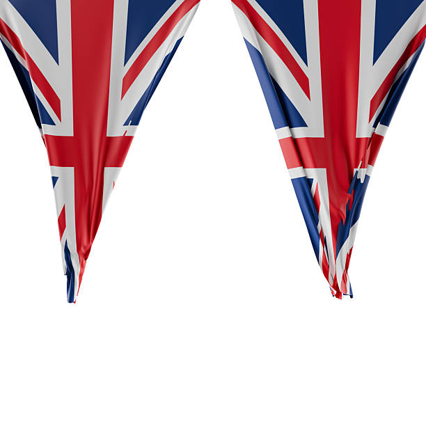 Small paper flags of United Kingdom as background, top view