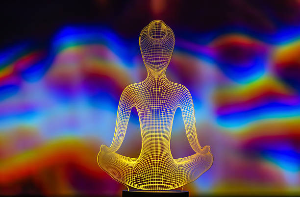 Glowing silhouette of a meditating yogi for a background